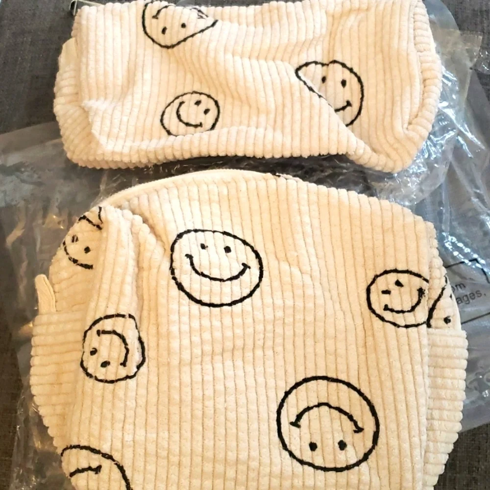 Lyanyan 2 Piece Makeup Bag Set in Beige Corduroy with a Black Smiley Face Print